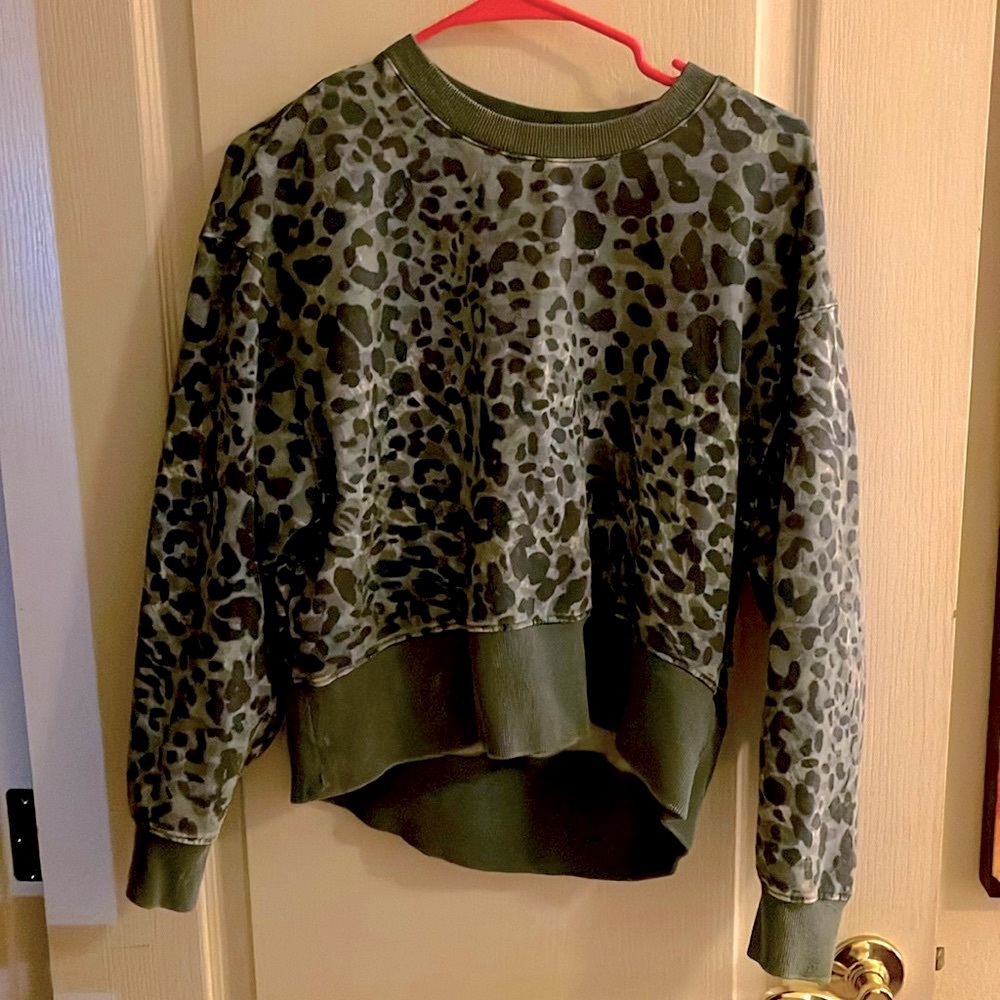 Animal print sweatershirt by Joy Lab size medium.  Falls just above the hip.